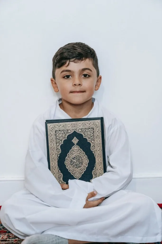 A Boy Holding a Book